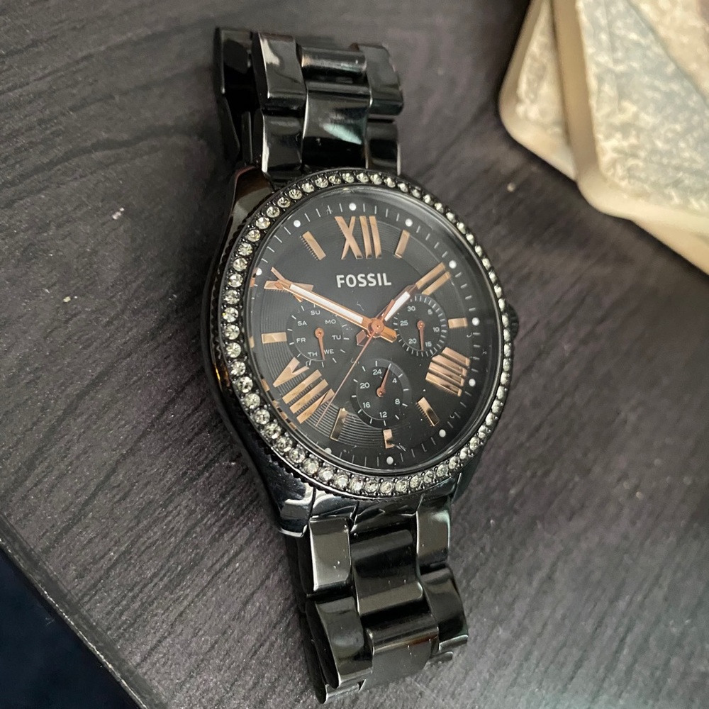Women’s Black and Rose Gold Watch